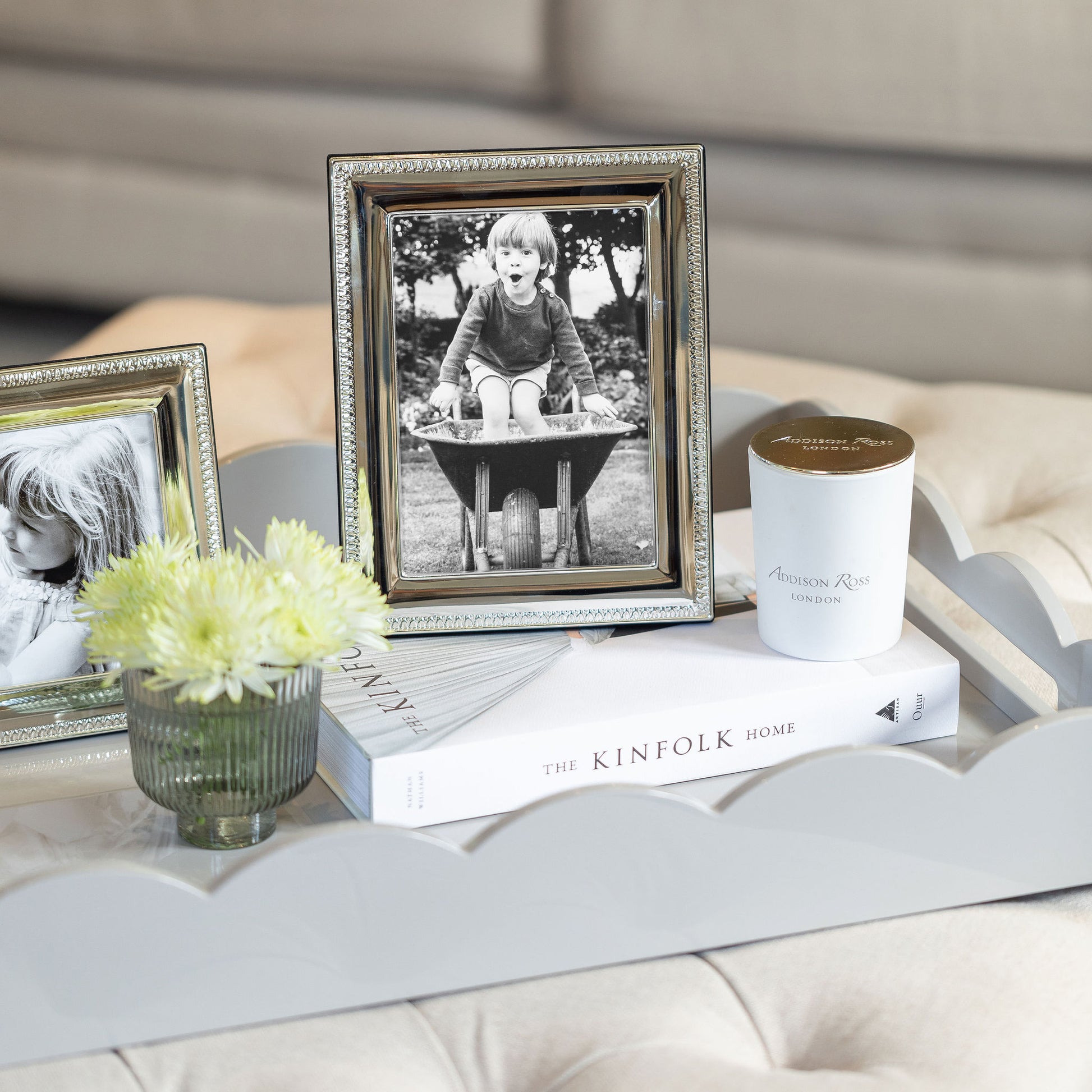 5x7 in. Embossed Silver Plated Photo Frame on a light gray serving tray