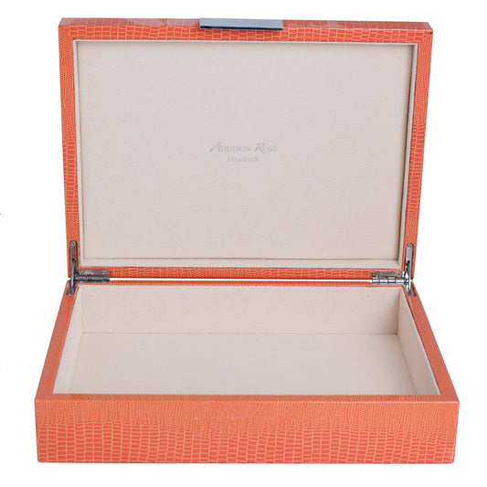 Large orange storage box with suede interior
